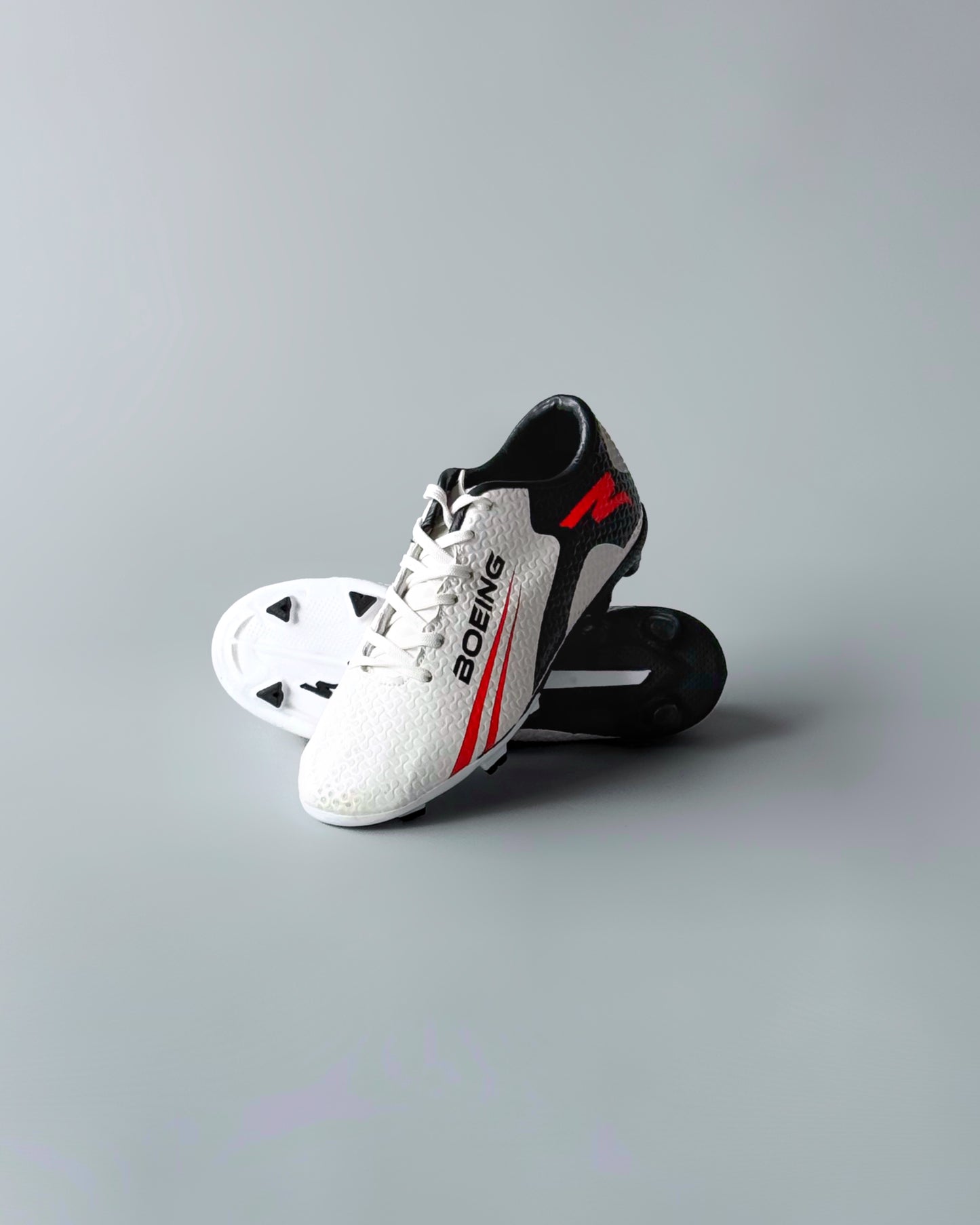 FELO BOEING FIRM GROUND FOOTBALL BOOTS BLACK/WHITE
