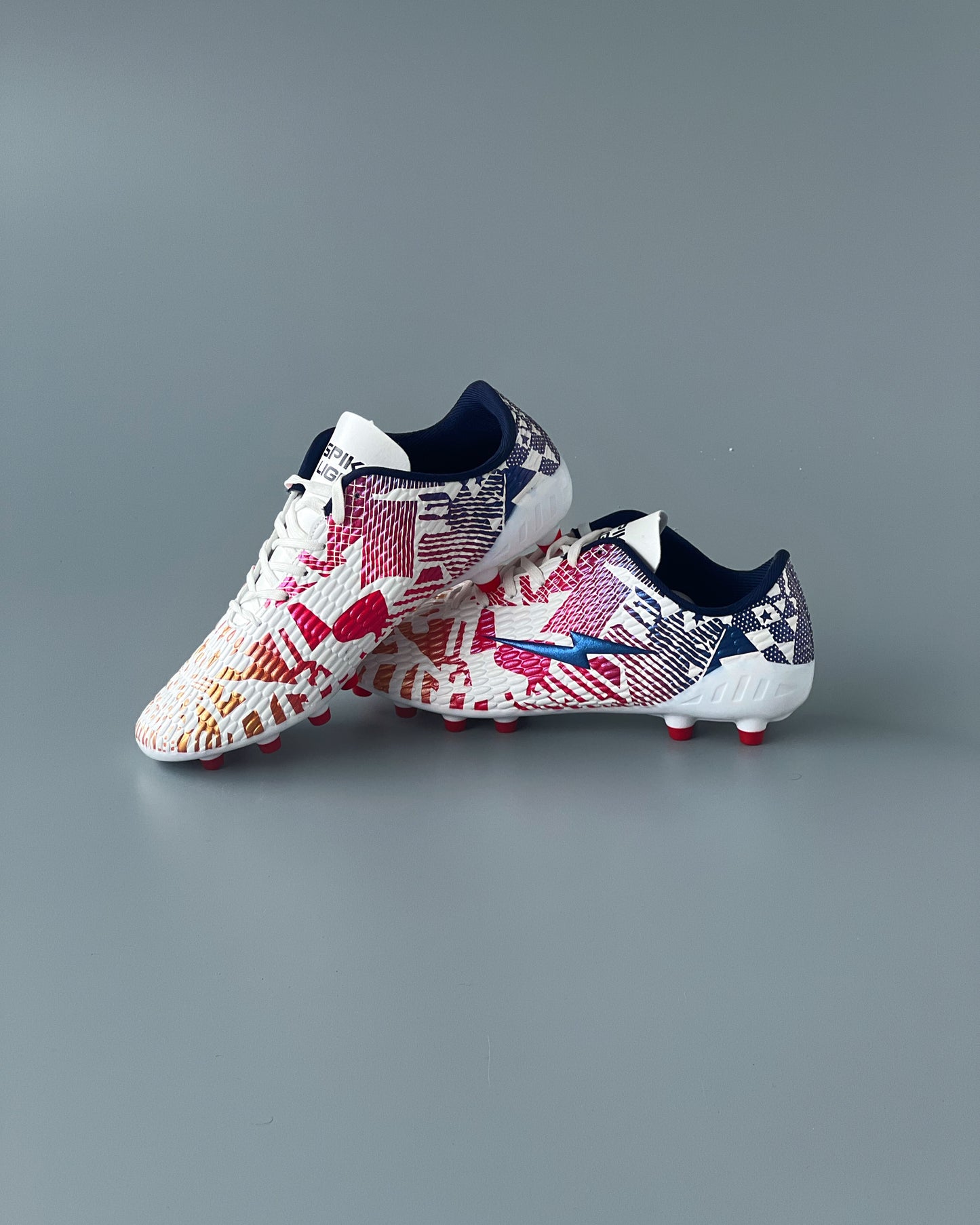 SPIKA LIGER FIRM GROUND FOOTBALL BOOTS WHITE/RED