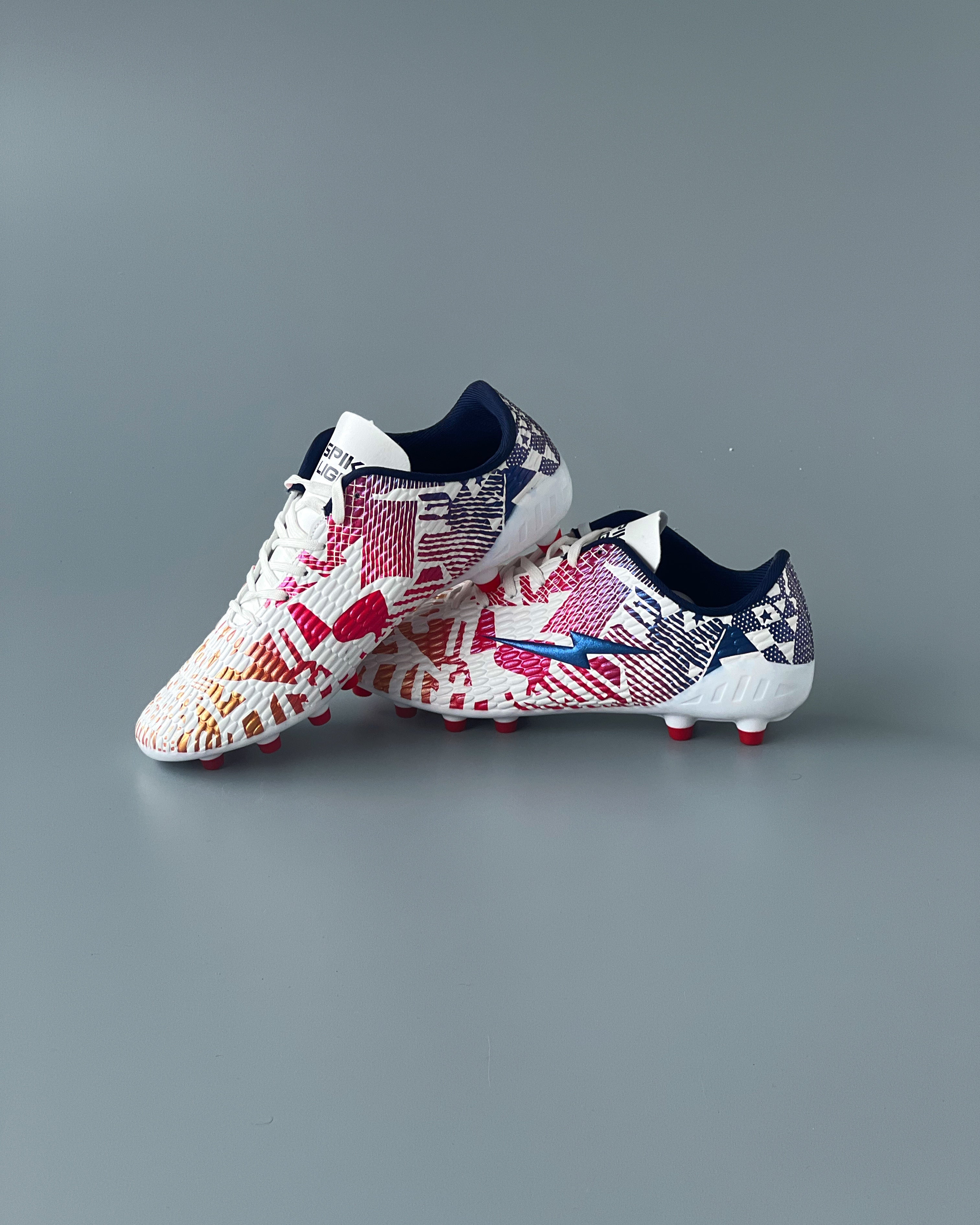 SPIKA LIGER FIRM GROUND FOOTBALL BOOTS WHITE/RED