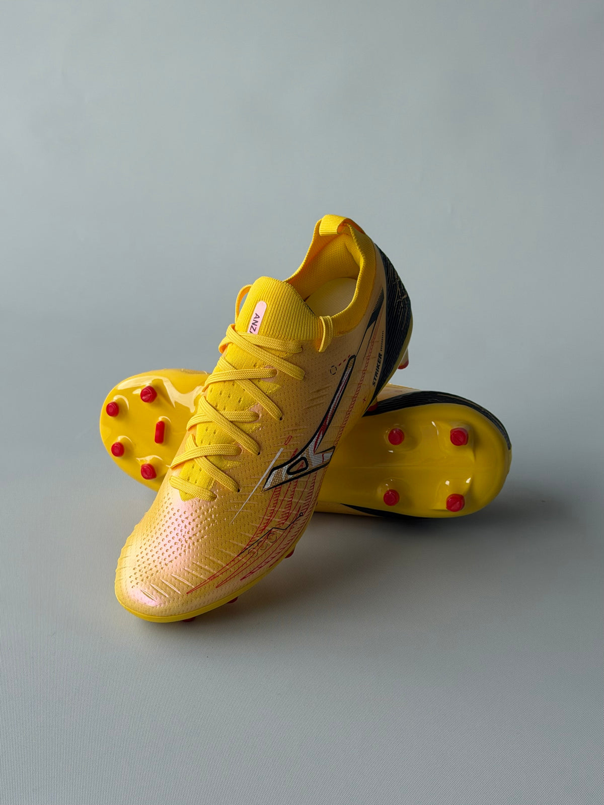 ANZA STRIKER YELLOW HARD GROUND FOOTBALL BOOT