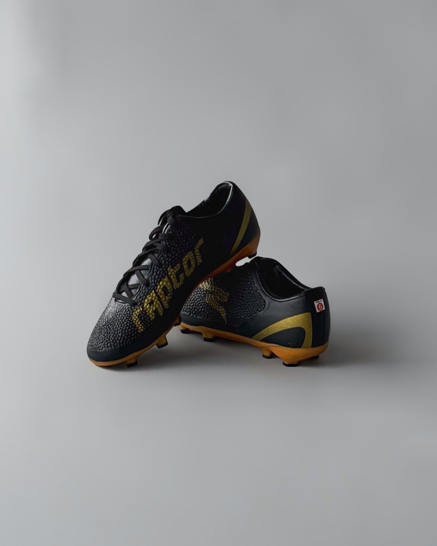 FELO RAPTOR FIRM GROUND FOOTBALL BOOTS BLACK/GOLD