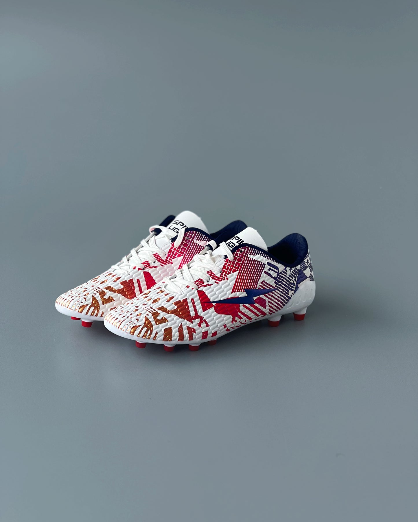 SPIKA LIGER FIRM GROUND FOOTBALL BOOTS WHITE/RED