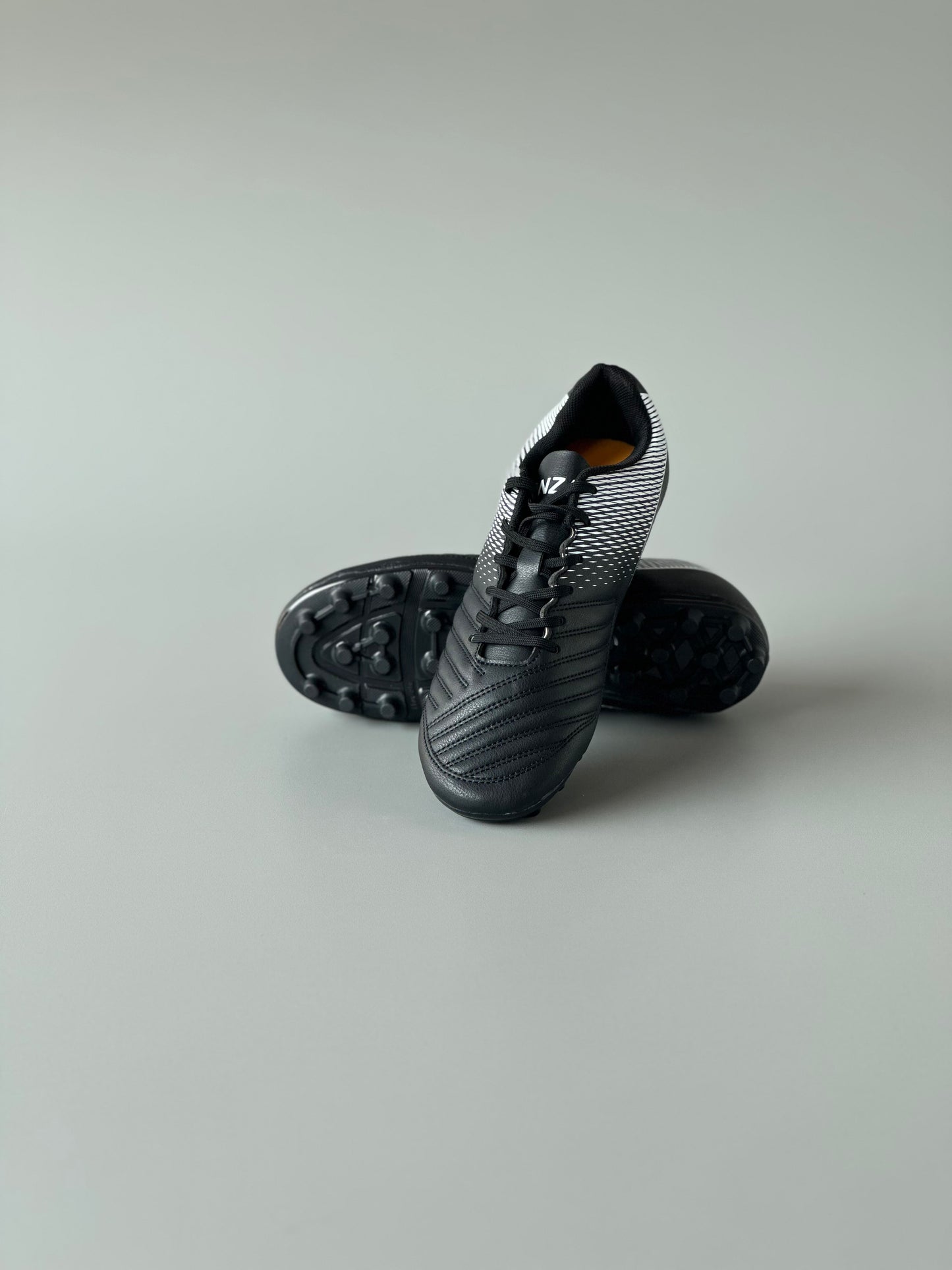 ANZA SHIELD MULTI GROUND FOOTBALL BOOTS BLACK