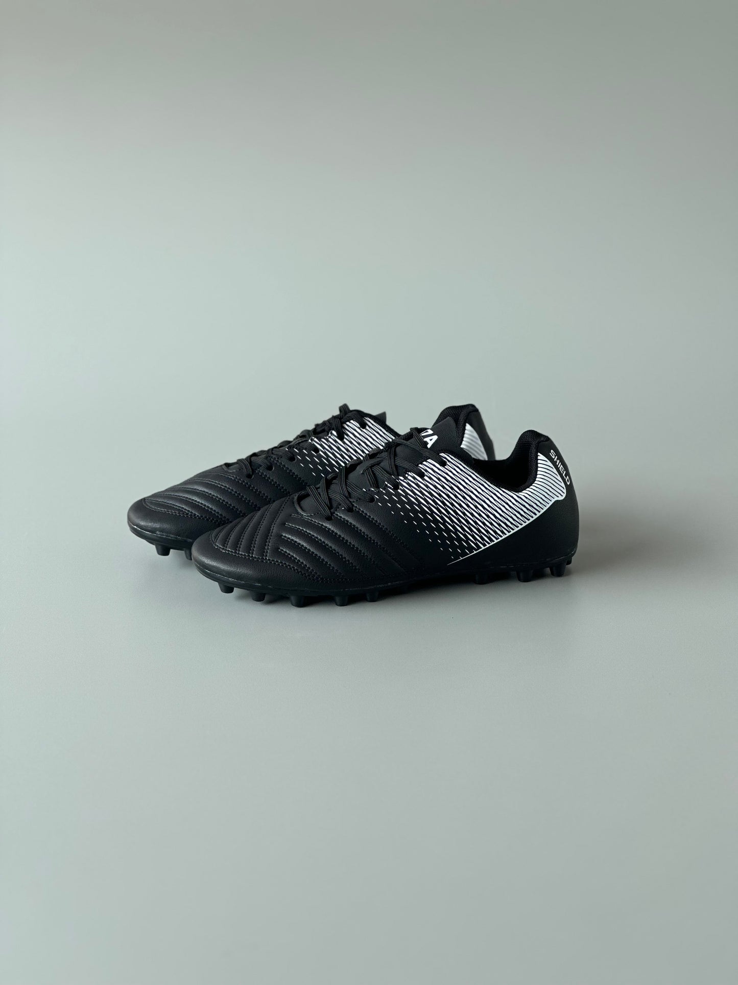 ANZA SHIELD MULTI GROUND FOOTBALL BOOTS BLACK